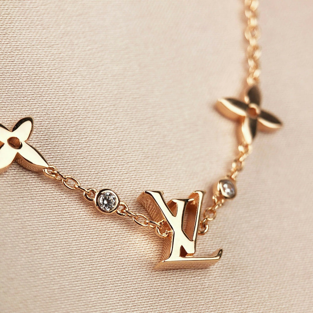 ¡®Dream¡¯STAR AND SUN 7 MOTIFS GOLD BRACELET