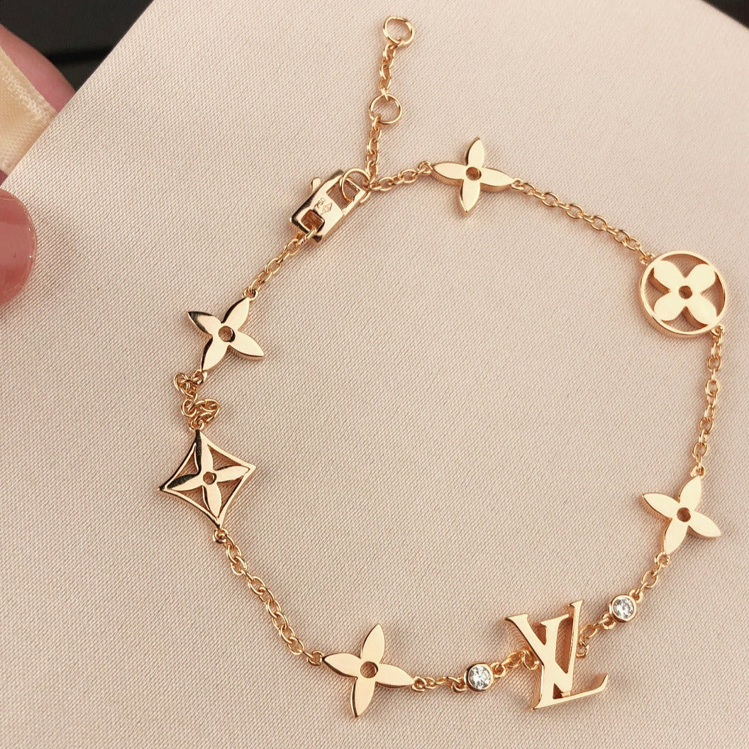 ¡®Dream¡¯STAR AND SUN 7 MOTIFS GOLD BRACELET