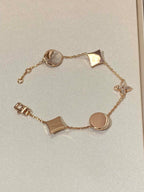 ¡®Dream¡¯STAR AND SUN 5 MOTIF MOP PINK GOLD BRACELET