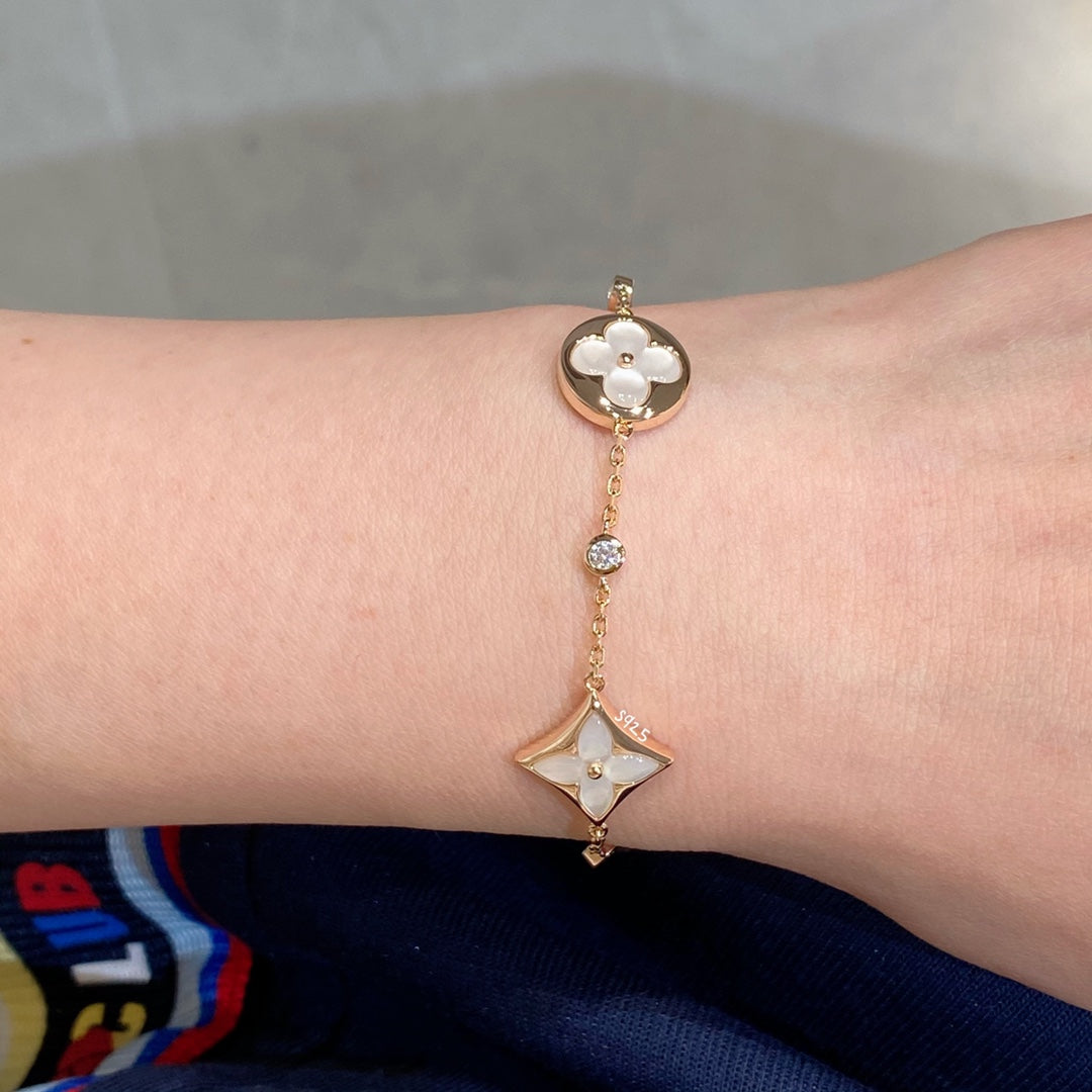¡®Dream¡¯STAR AND SUN 4 MOTIF WHITE MOP PINK GOLD BRACELET