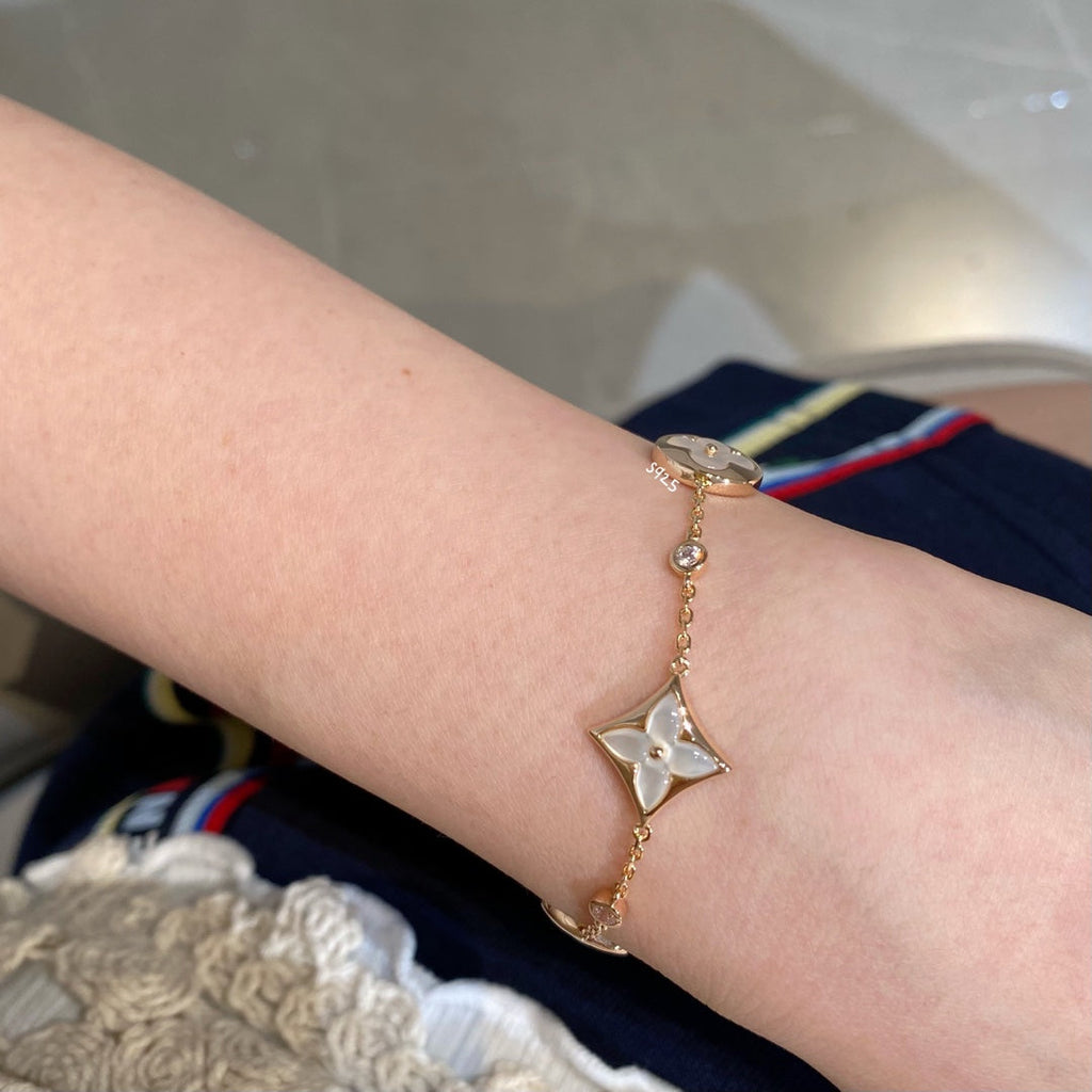 ¡®Dream¡¯STAR AND SUN 4 MOTIF WHITE MOP PINK GOLD BRACELET