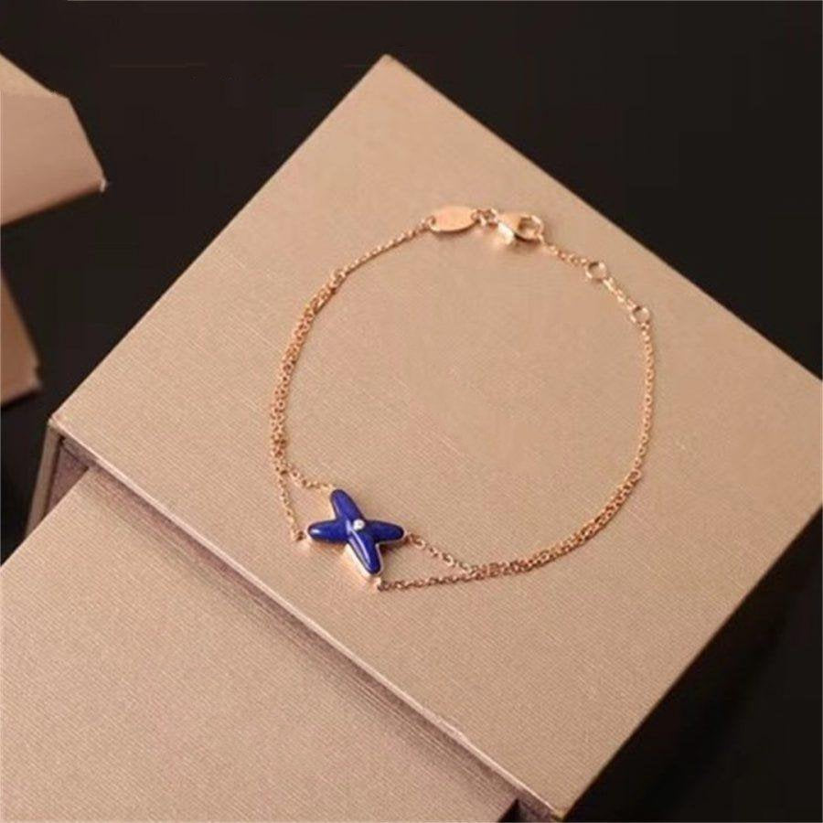 ¡®Dream¡¯Hollow Design Four-Leaf Clover Flower Shape Ring